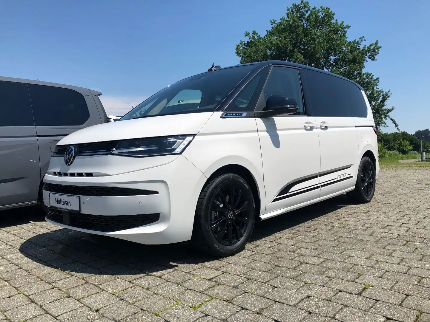Volkswagen T7 Multivan 2.0 TDI  Edition  Modell 2025 - VFW Weiß - 1