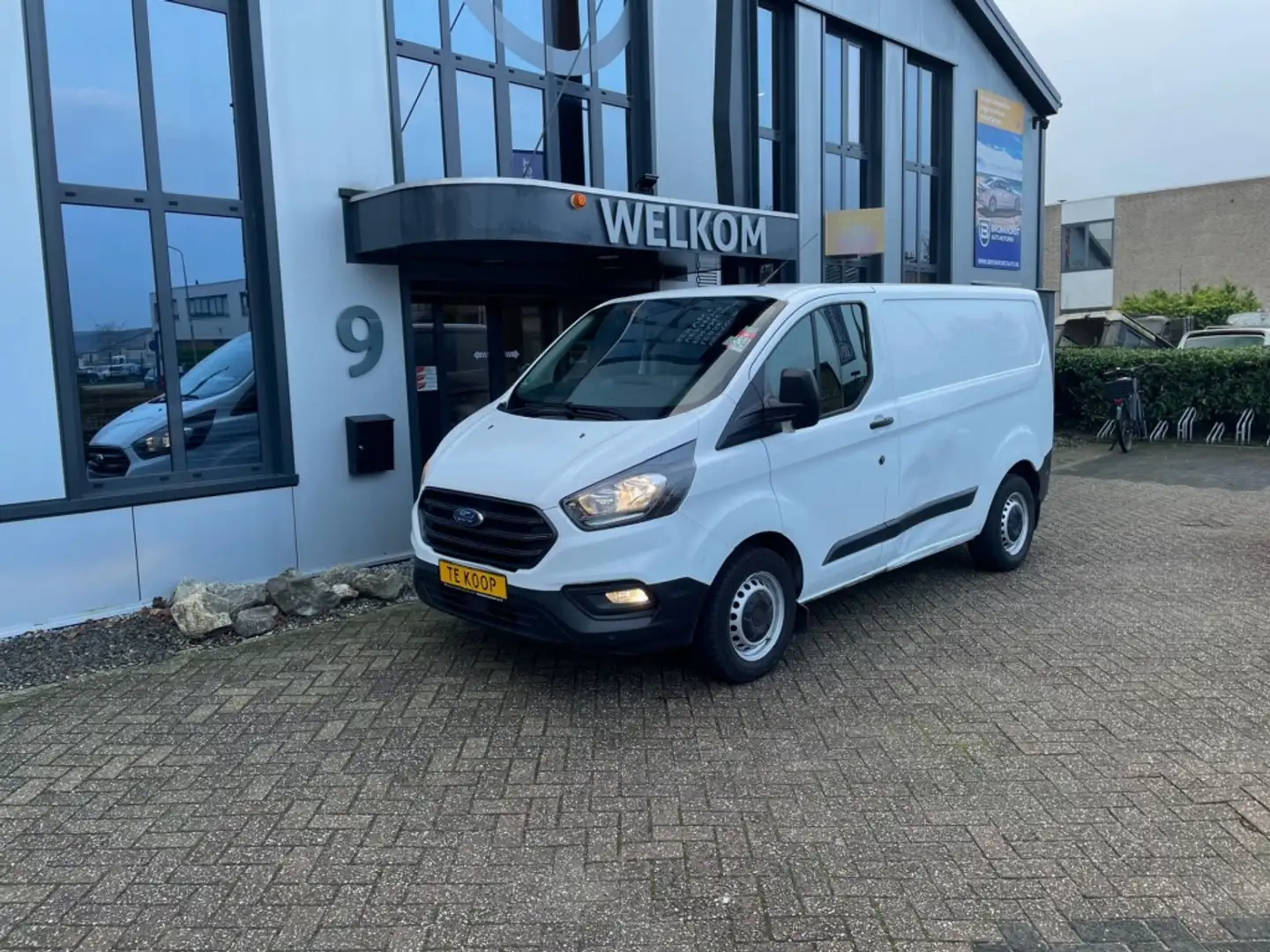 Ford Transit Custom 2.0 Tdci 108pk, airco, 3-pers, pdc, schuifdeur, bl Wit - 1