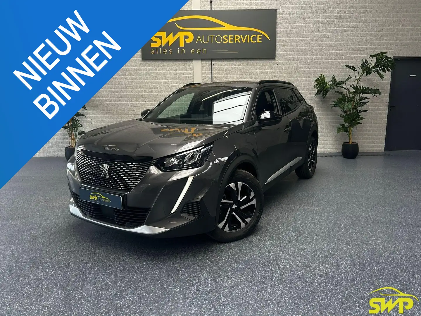 Peugeot 2008 1.2 PureTech Allure | 130pk | Navi | Cam Gris - 1