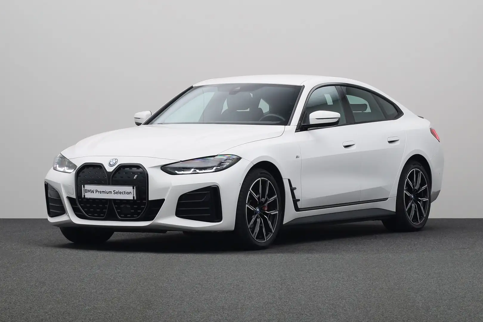 BMW i4 eDrive40 High Executive 84 kWh | Achteruitrijcamer Wit - 1