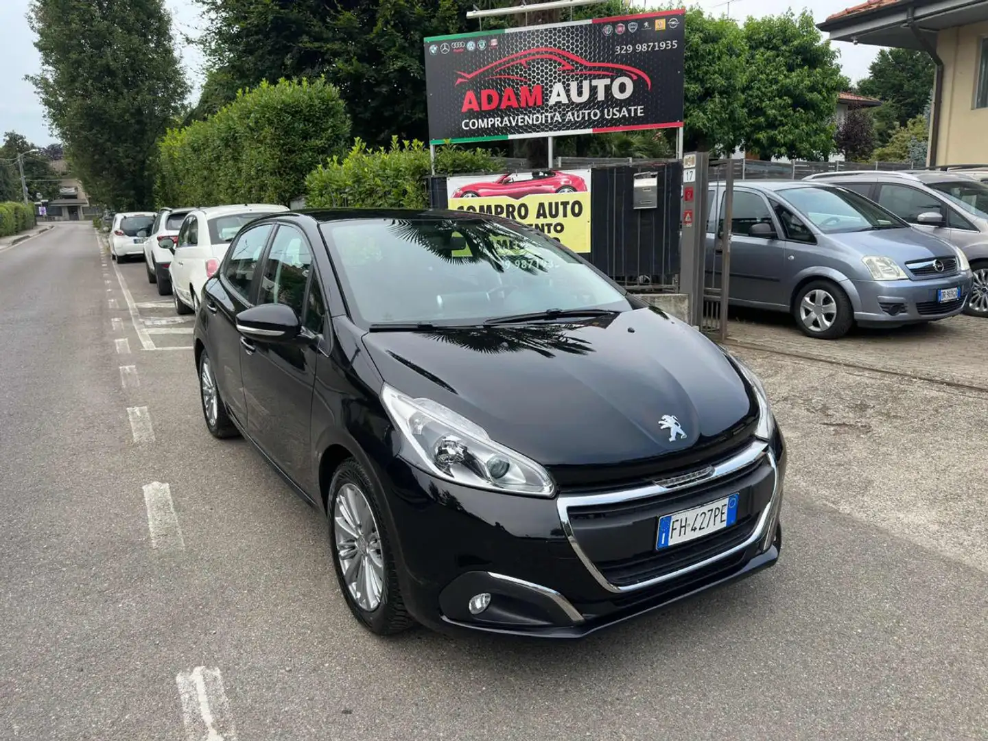 Peugeot 208 1° serie PureTech 82 5 porte Allure Zwart - 1