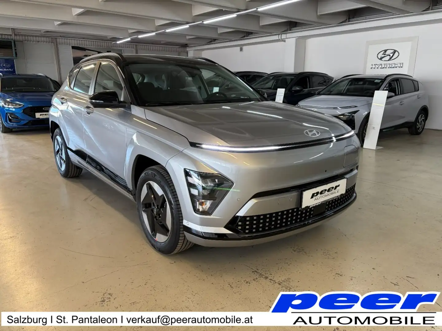 Hyundai KONA KONA EV (SX2) Smart Line 48,6 kWh k6es1-PP1-OO2/O5 Silber - 1