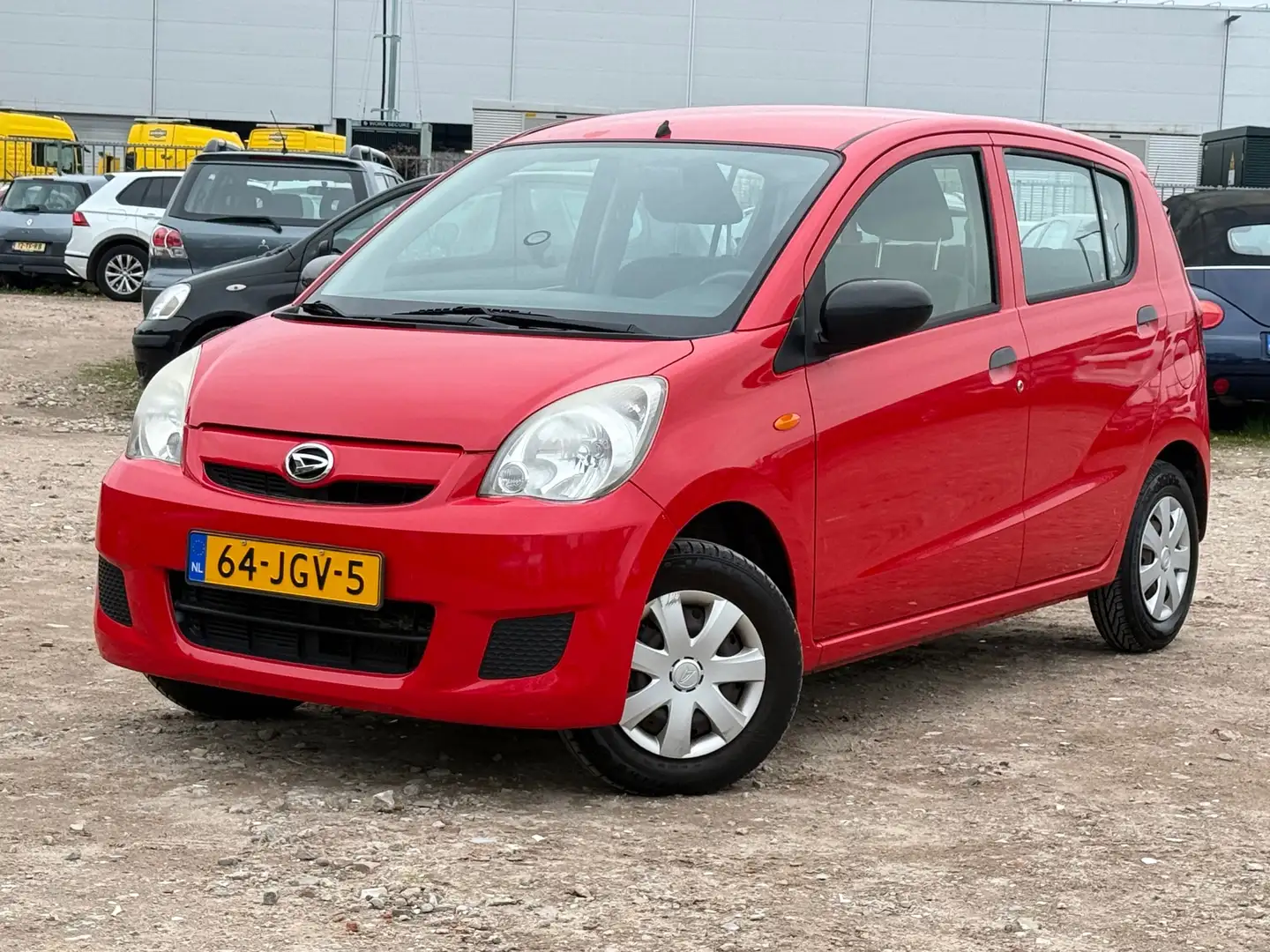 Daihatsu Cuore 1.0 Comfort/ZEER ZUINIG/ LAAG KM Rojo - 1