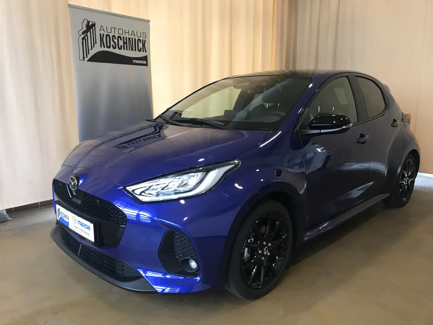 Mazda 2 Hybrid 1.5L VVT-i 116 e-CVT FWD HOMURA PLUS Bleu - 1
