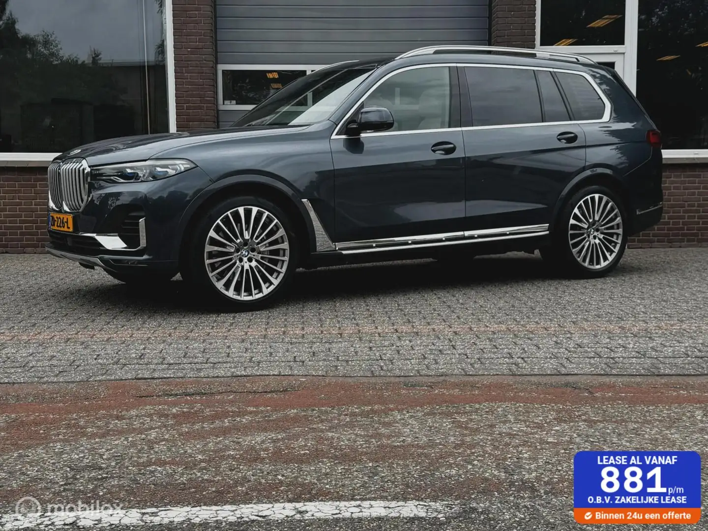BMW X7 Xdrive40i HIGH EXE NAVI/HEAD-UP/B&W/PANO VOL! Grijs - 1