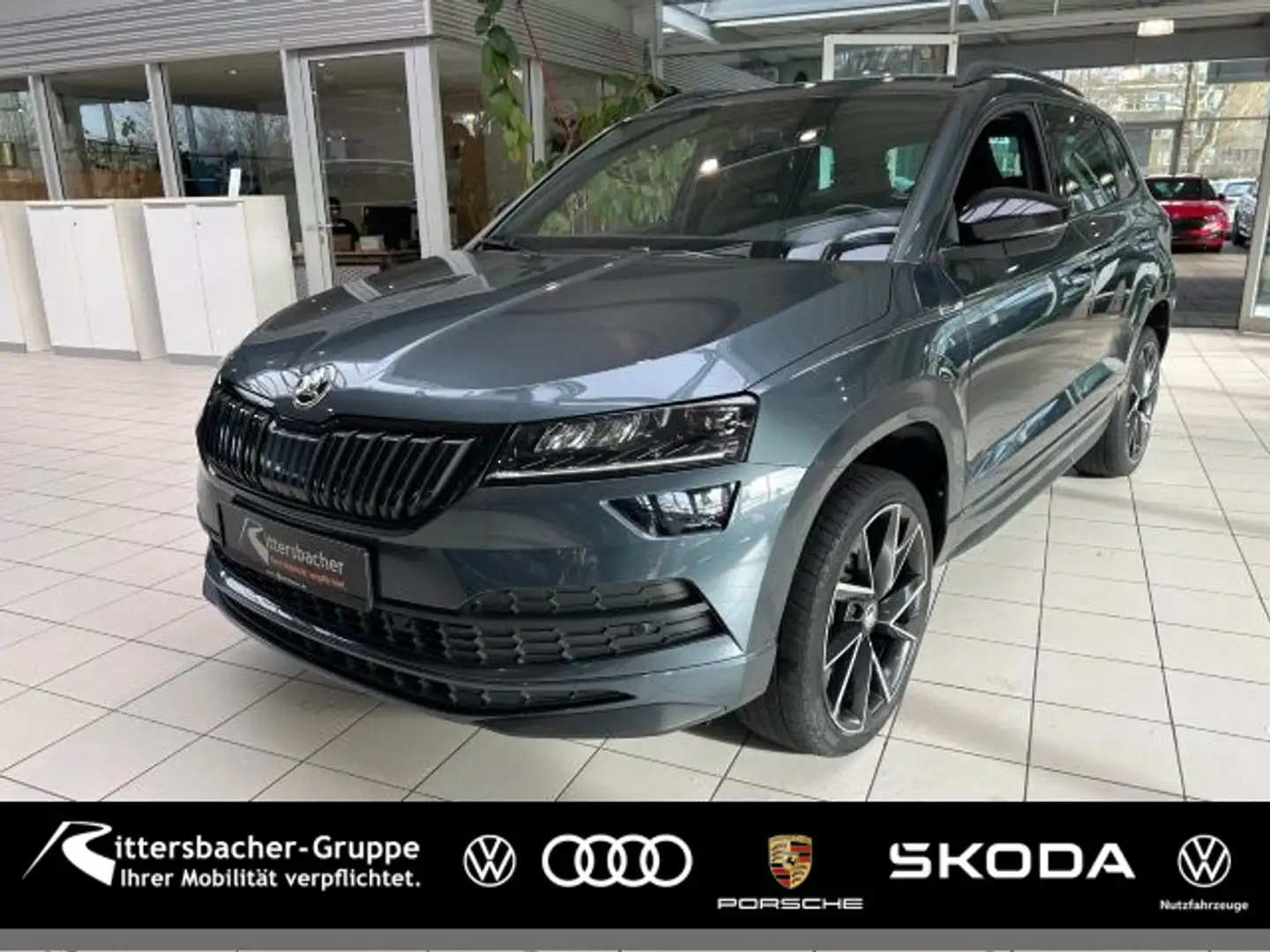Skoda Karoq Sportline 1.5 TSI DSG Navi Canton PDC Grau - 1