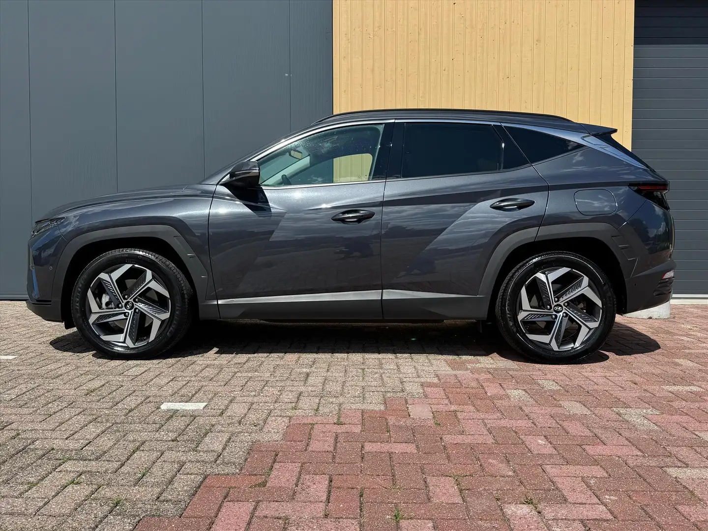 Hyundai TUCSON 1.6 T-GDi HEV 230pk Aut. Premium | NL Auto | Trekh Grijs - 2