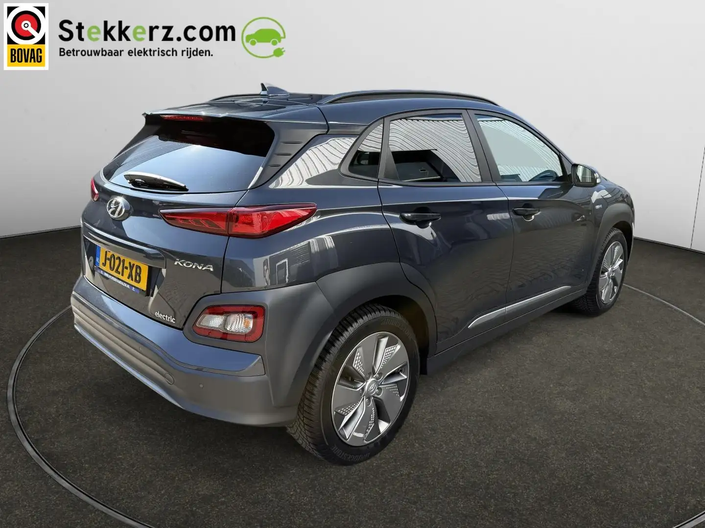Hyundai KONA EV Premium 64 kWh Schuifdak, leer, SOH 99% Grijs - 2
