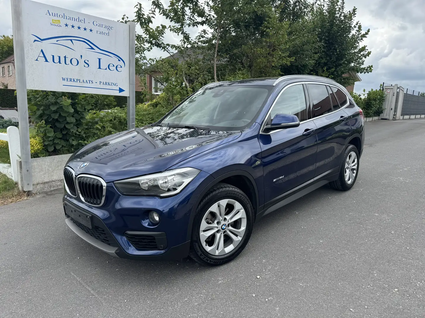 BMW X1 sDrive18d Automaat/panodak/leder/nieuwstaat/… Blauw - 1