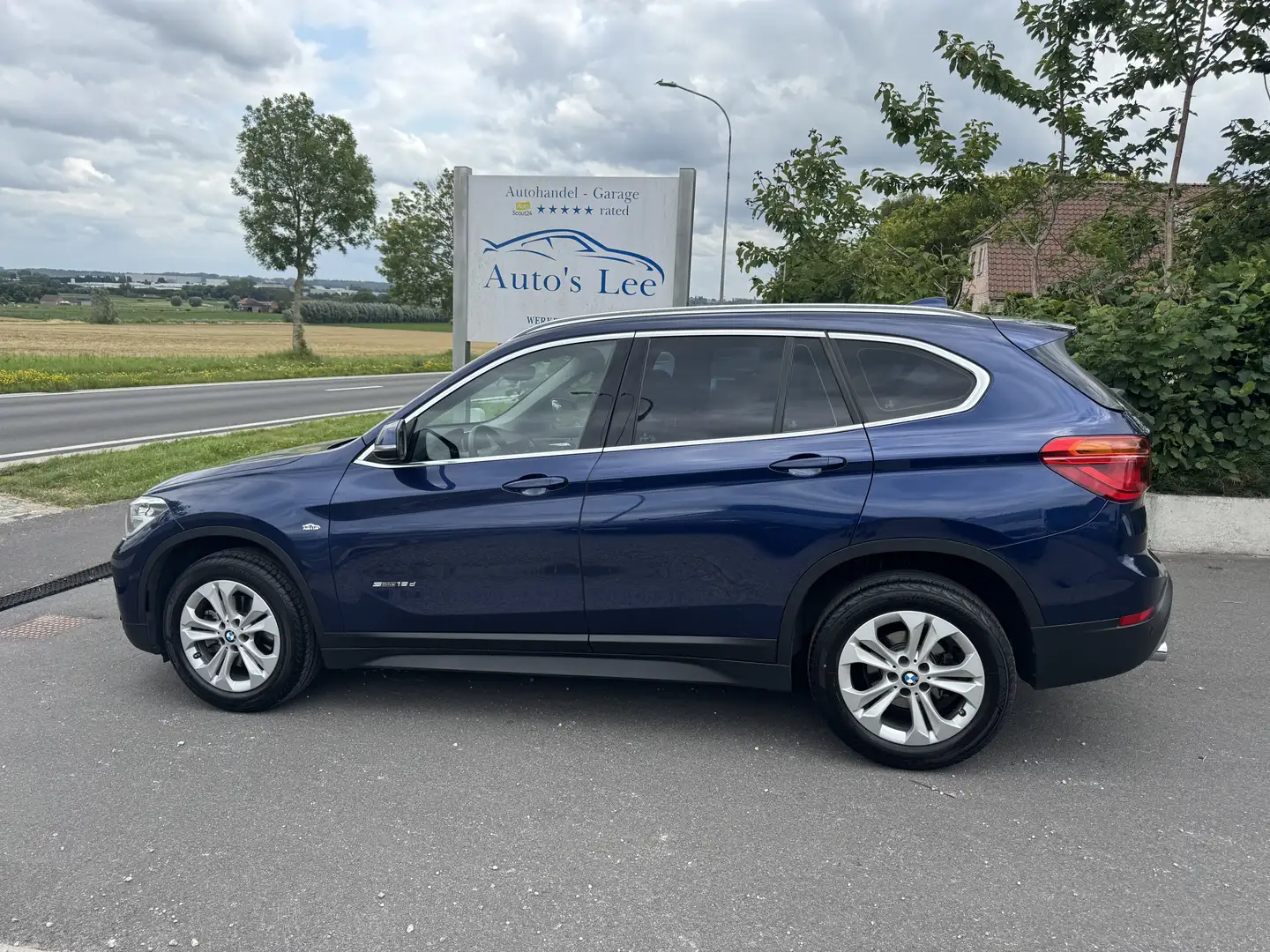 BMW X1 sDrive18d Automaat/panodak/leder/nieuwstaat/… Blauw - 2