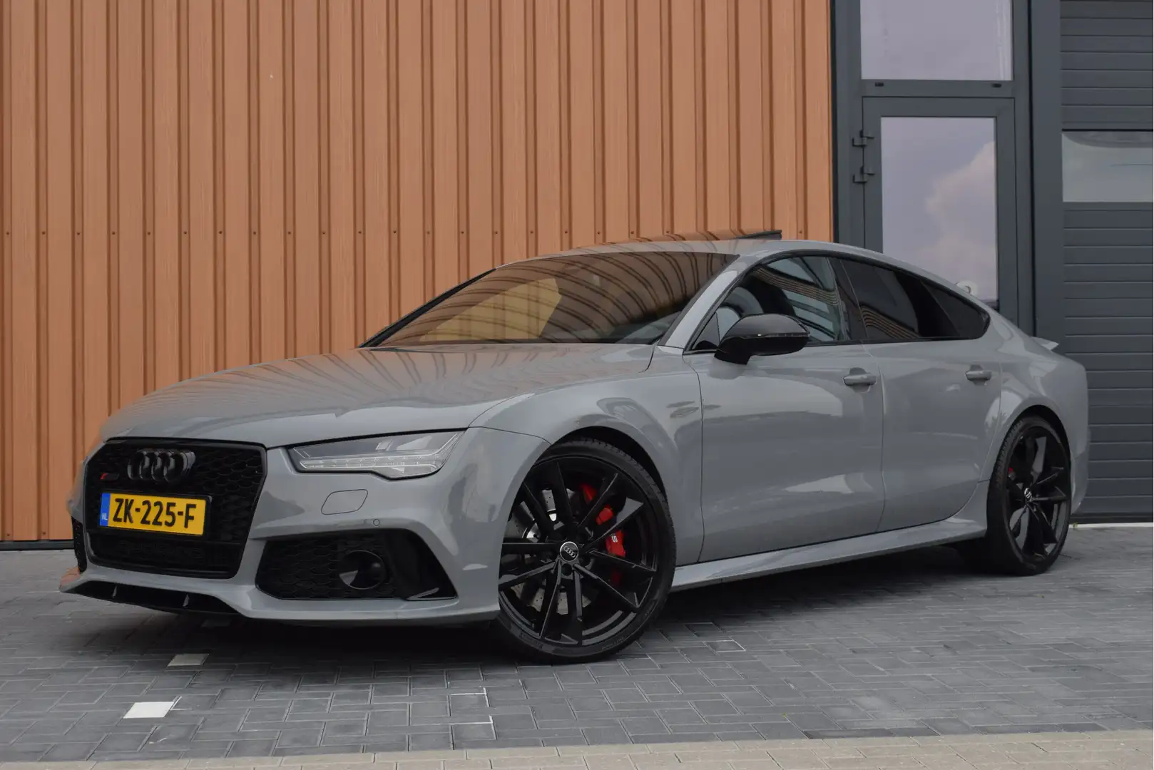 Audi RS7 4.0 V8 TFSI 605pk Quattro Performance | Akrapovič Grau - 1