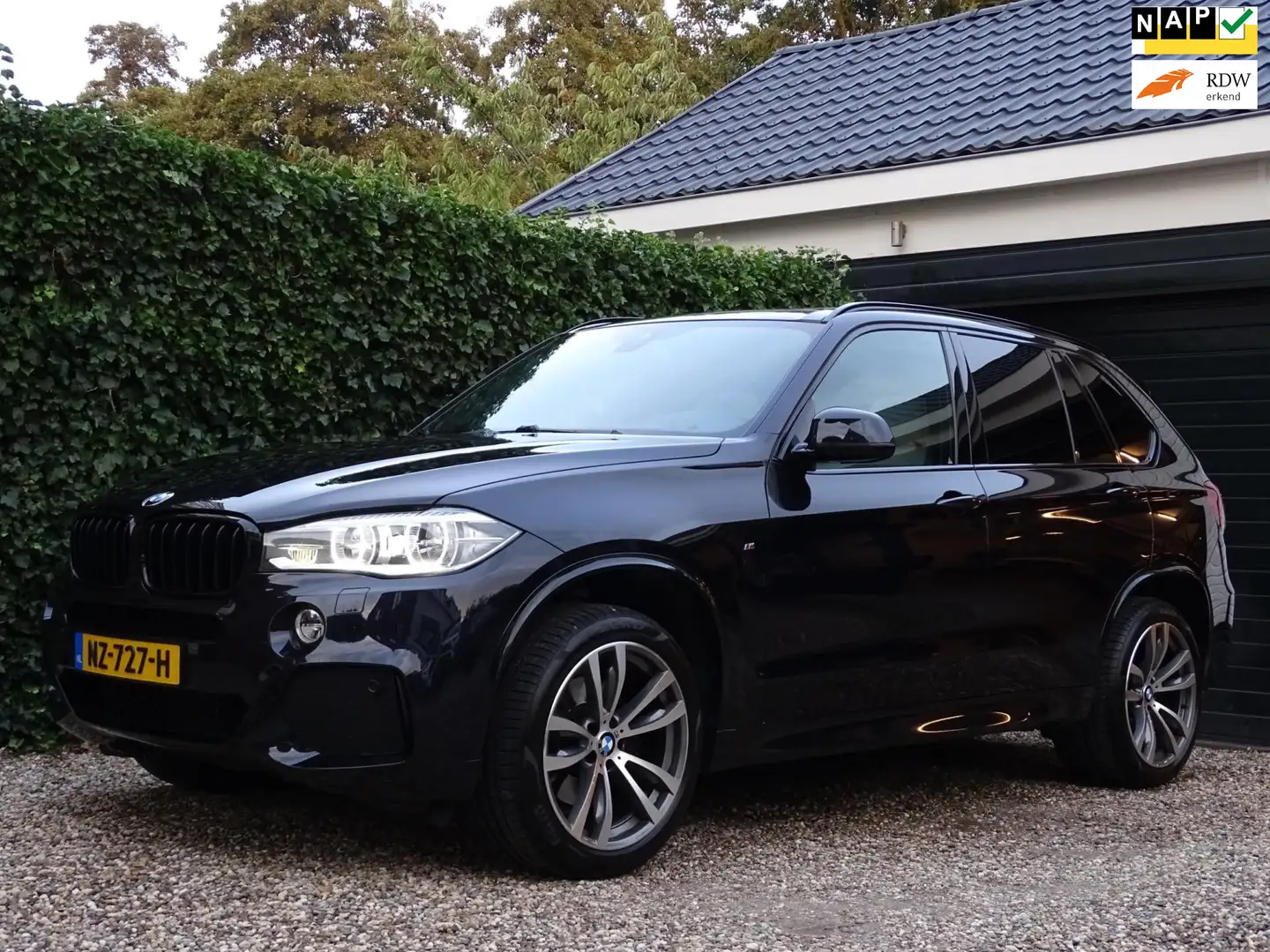 BMW X5 XDrive35i High Executive | M- pakket | HUD | Harma Zwart - 1