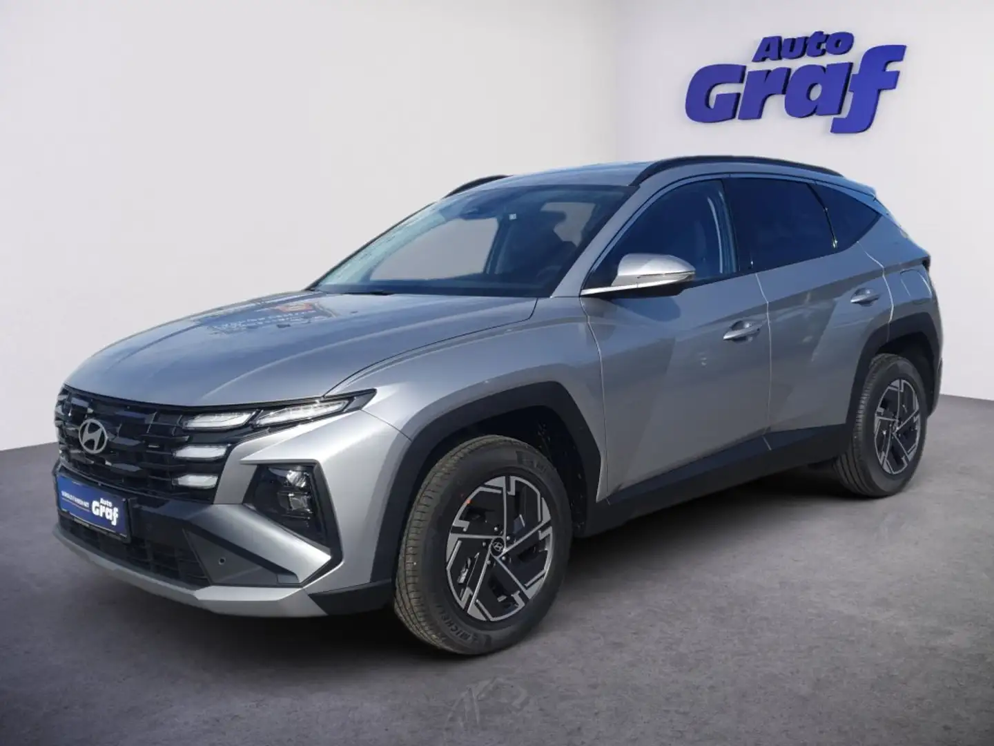 Hyundai TUCSON NX4 Jubile 1,6 T-GDi HEV 2WD AT t6hj1 Silber - 1