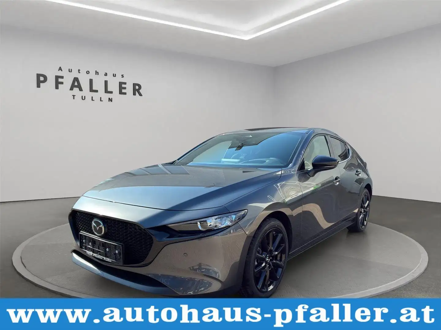 Mazda 3 e-Skyactiv-G140 Homura Grau - 1