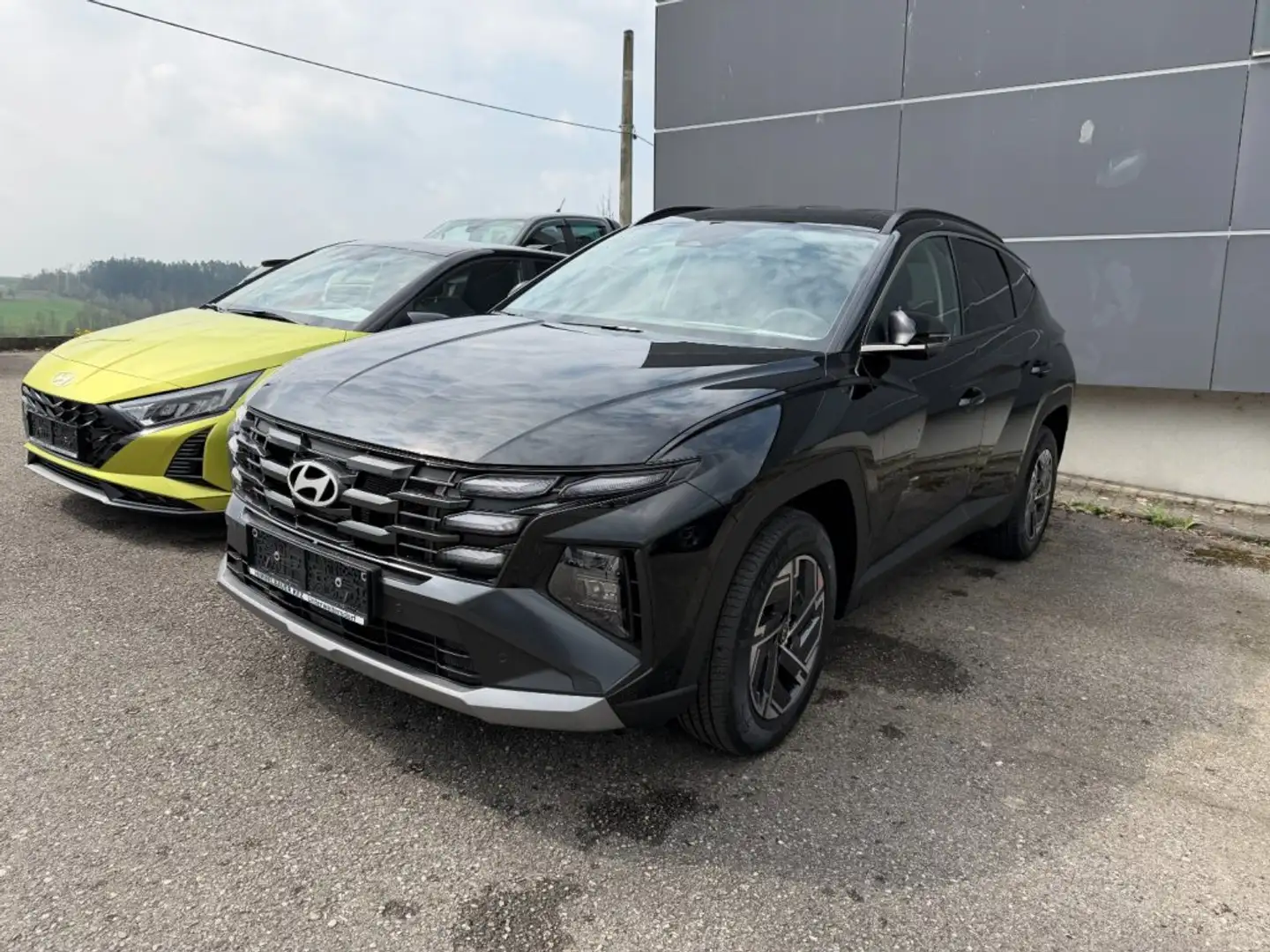 Hyundai TUCSON NX4 Jubile 1,6 T-GDi HEV 2WD AT t6hj1 Schwarz - 1