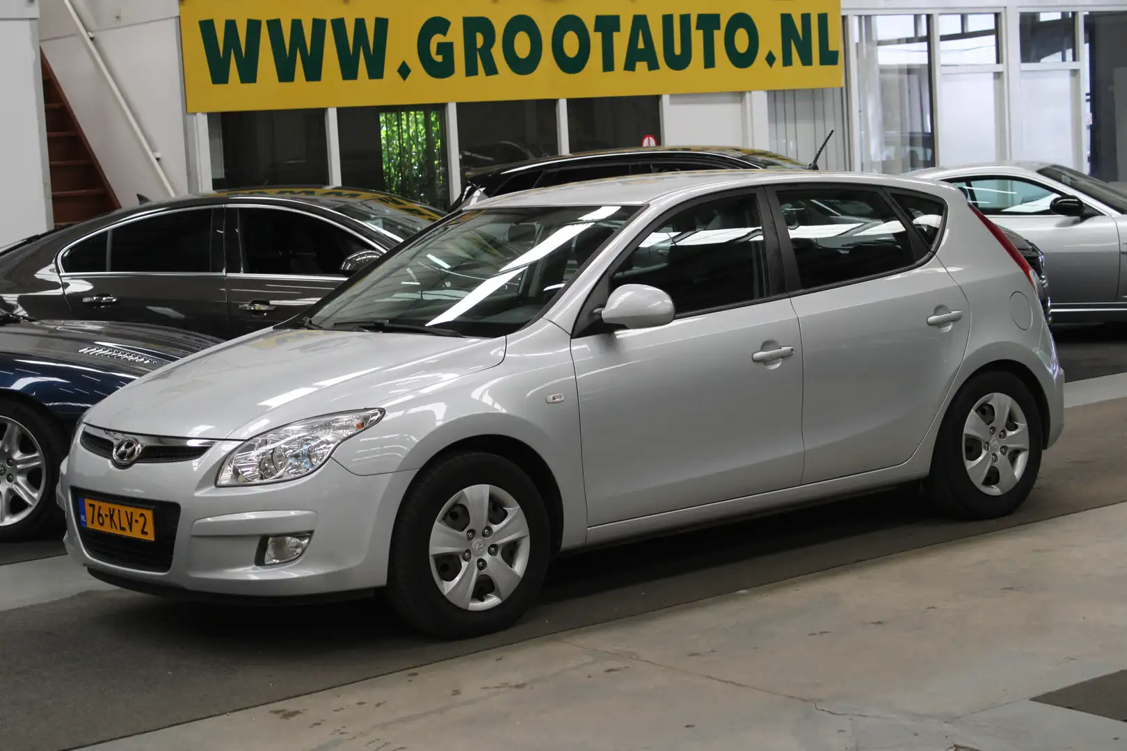 Hyundai i30 1.4i Blue Dynamic Dealer onderhouden, 94.497km NAP Grijs - 1