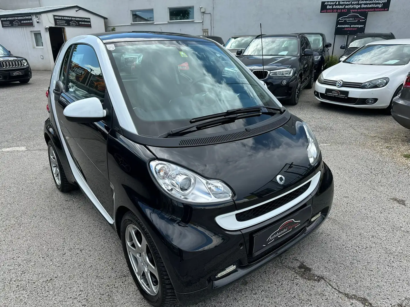 smart forTwo passion 1,0 Allwetterreifen Navi Klimaautomatik Schwarz - 1