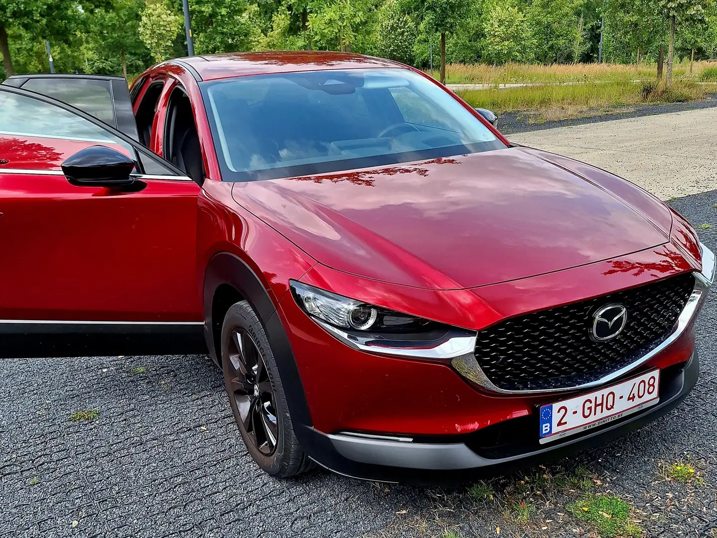 Mazda CX-30 CX-30 e-SKYACTIVE G 122 SKYACTIV-Drive HOMURA Rood - 1