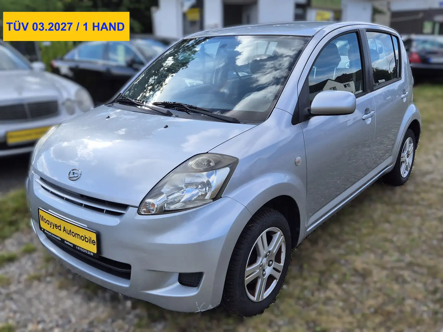 Daihatsu Sirion Sirion 1.3 Klima  4 Tür 1 Hand TÜV 03.2027 Grau - 1