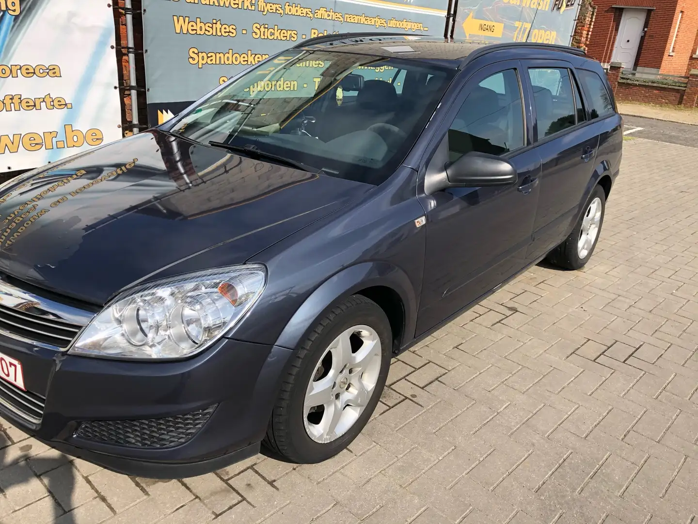 Opel Astra 1.7 CDTI Caravan DPF Blauw - 1