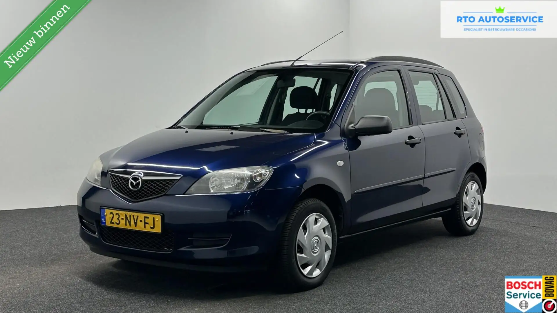 Mazda 2 1.2 Exclusive TREKHAAK. Bleu - 1