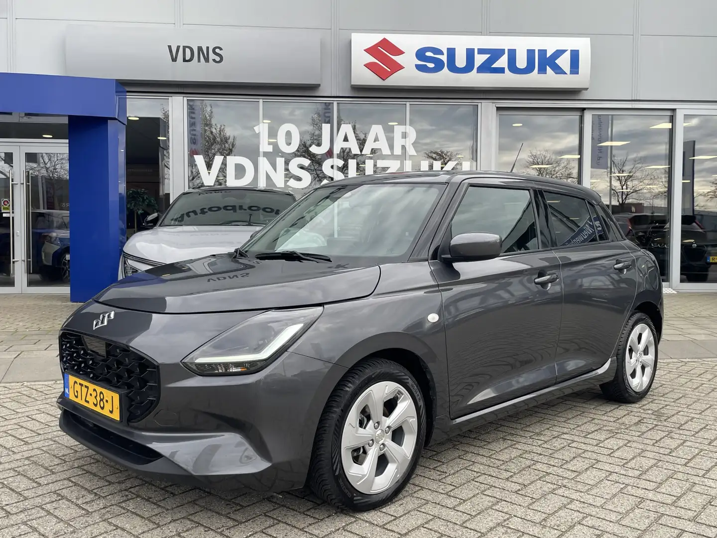Suzuki Swift 1.2 Select Smart Hybrid Fabrieksgarantie Navigatie Grijs - 1
