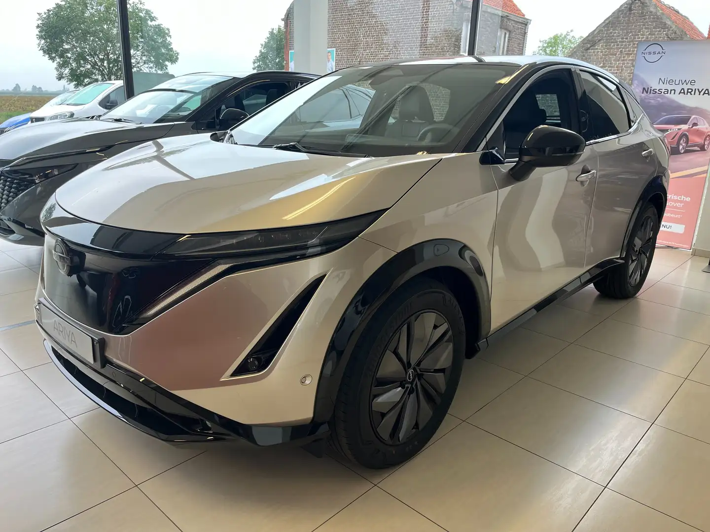 Nissan Ariya 87 kWh Evolve + 22 kw lader Or - 1