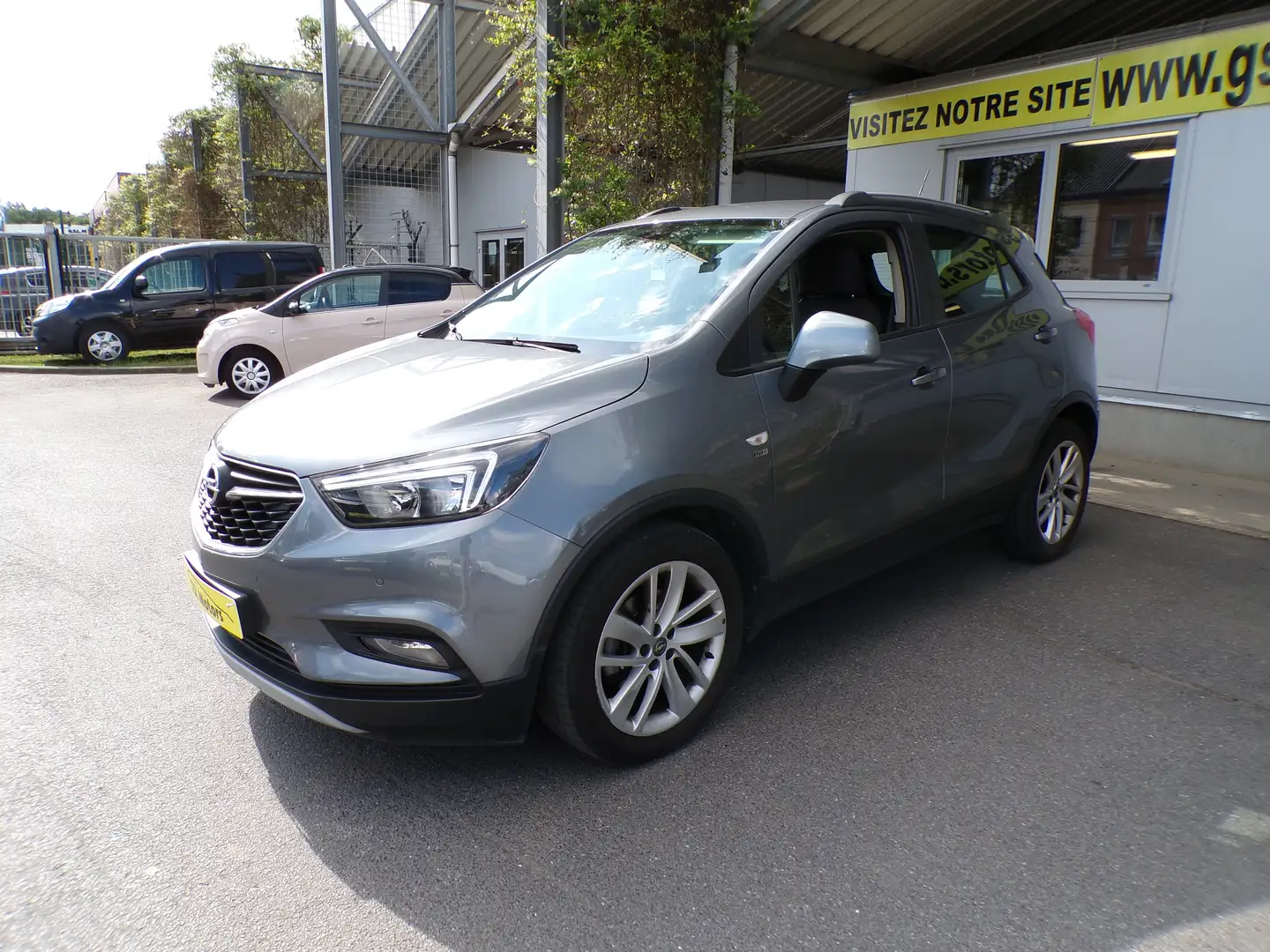 Opel Mokka X 1.4 120cv gris 02/19 68.513km Airco GPS Cruise USB Gris - 1