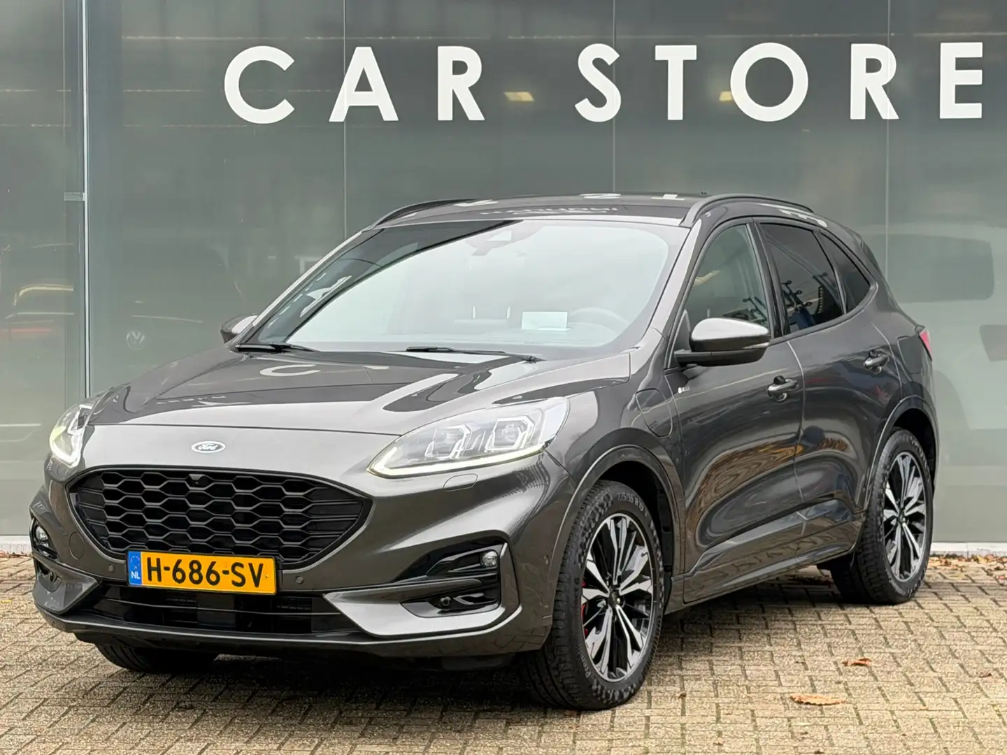 Ford Kuga 2.5 PHEV ST-Line X TREKHAAK B&O Dealer onderhouden Gris - 1