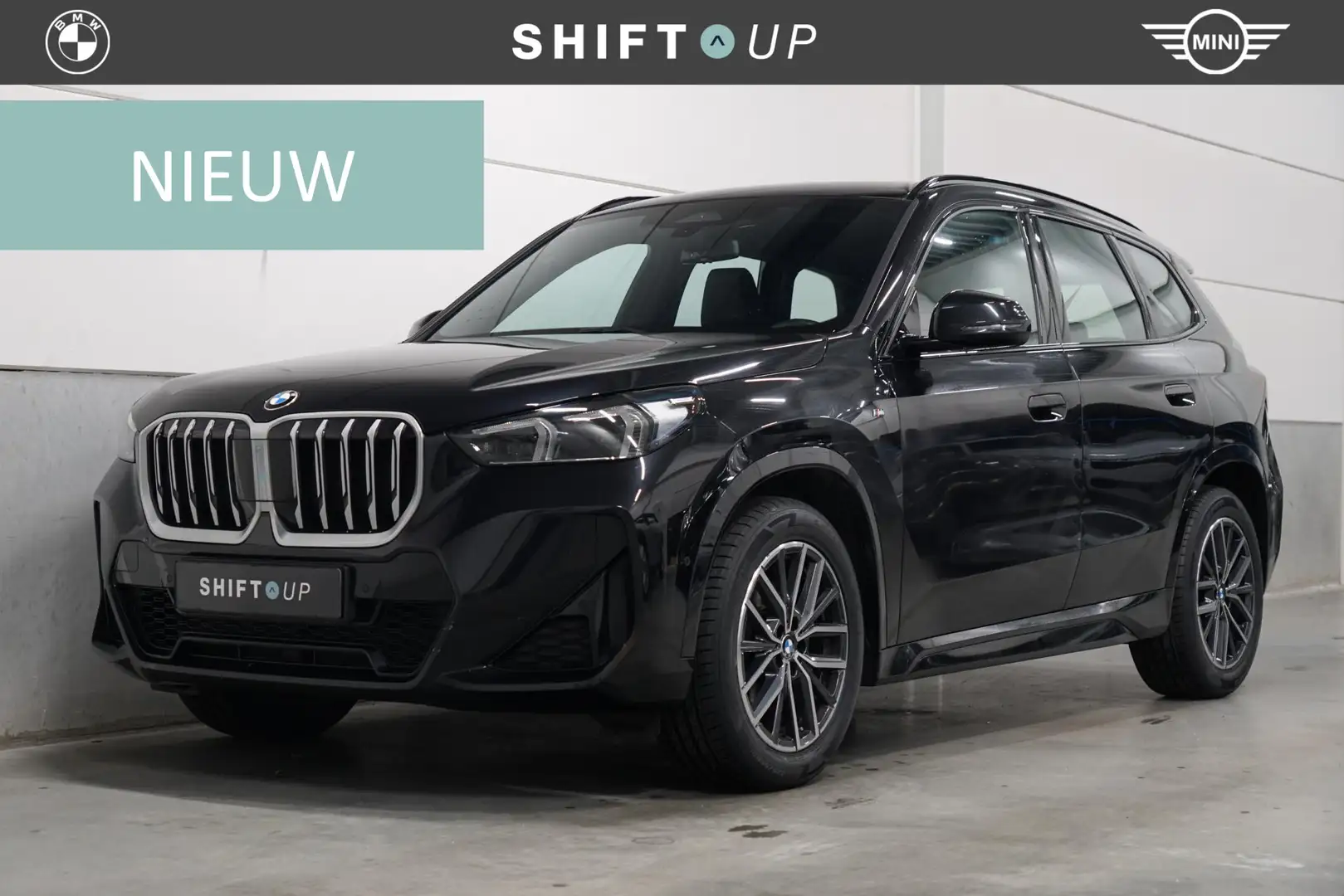BMW X1 sDrive18i M-Sport | Elektr. Trekhaak | Camera | Co Zwart - 1