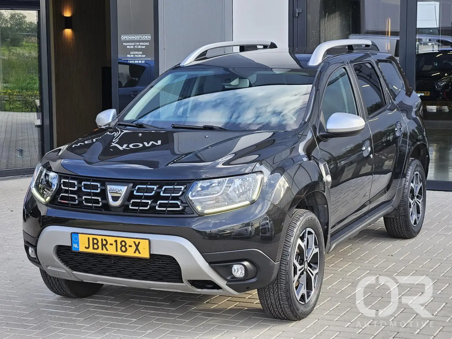 Dacia Duster 1.6 SCe Prestige Navi Cam Cruise 43.000km 1e eig Zwart - 1