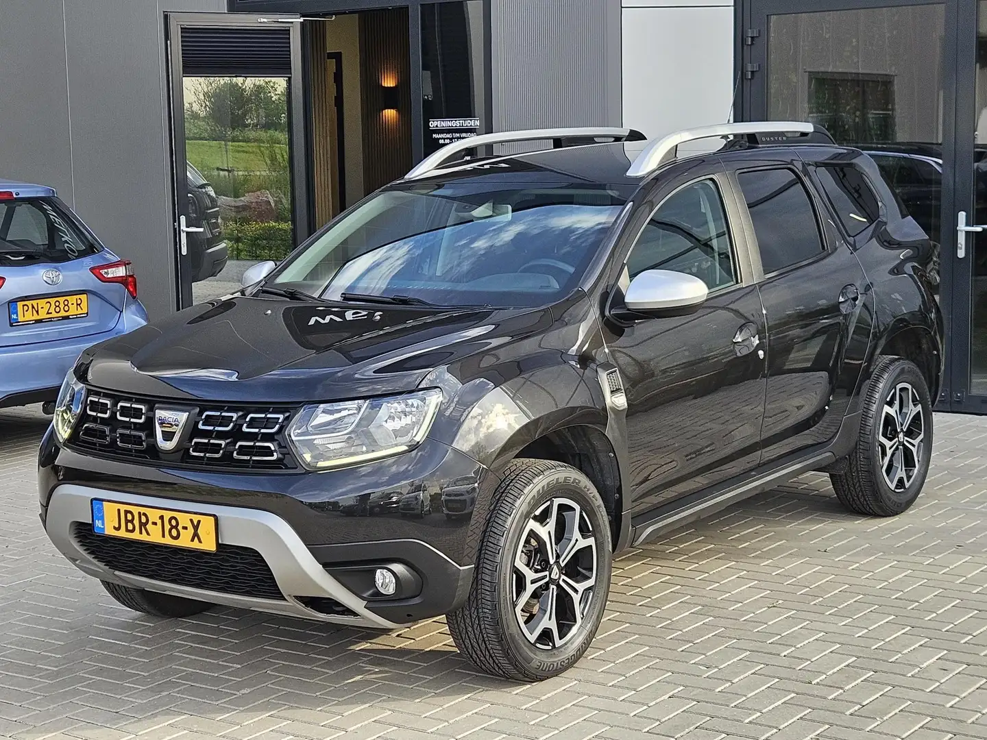 Dacia Duster 1.6 SCe Prestige Navi Cam Cruise 43.000km 1e eig Zwart - 2
