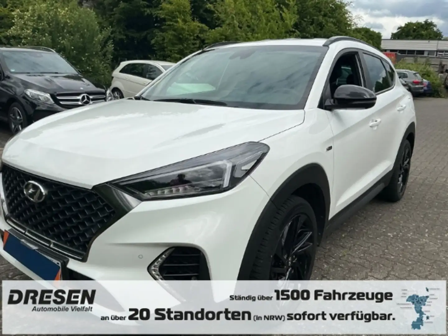 Hyundai TUCSON N Line 4WD Automatik 2.0 CRDi Navi Soundsystem 360 Weiß - 1