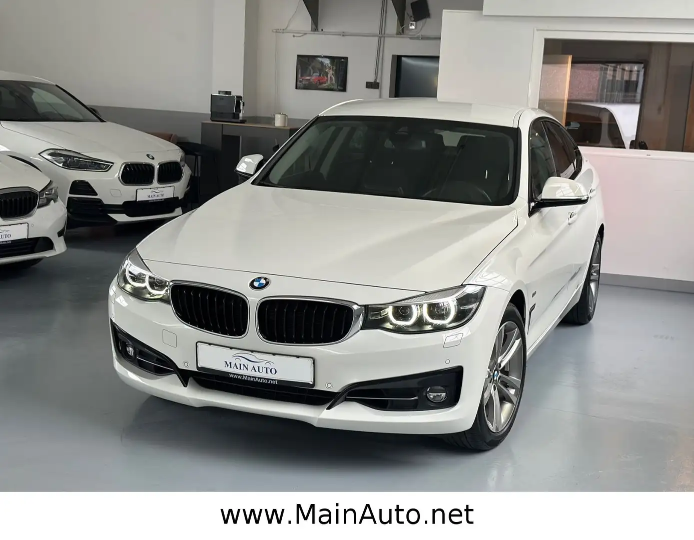 BMW 320 320i GT xDrive Sport Line/AHK/SPUR/HiFi/KeyGO Weiß - 1