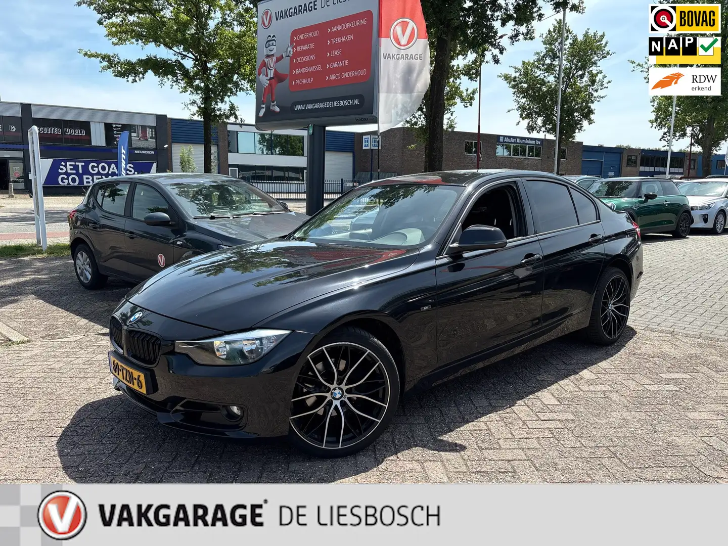 BMW 320 3-serie 320i High Executive,navi,sport,boeken,orig Zwart - 1