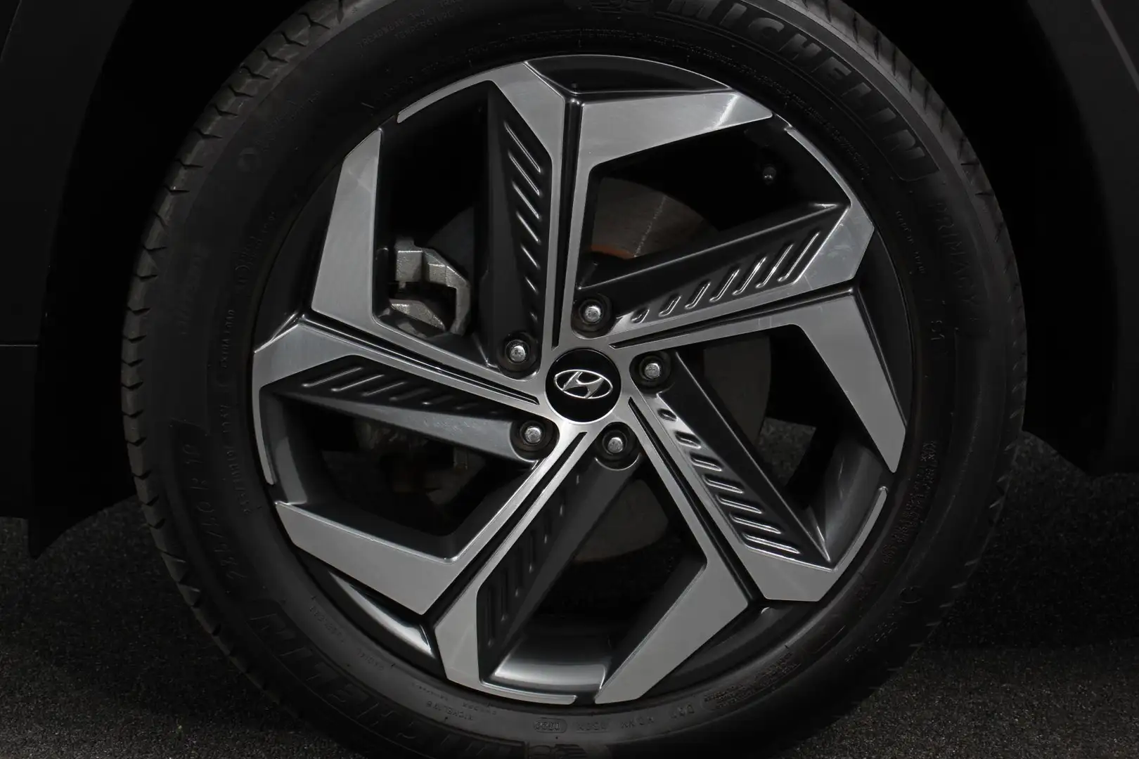 Hyundai TUCSON 1.6 T-GDI 265pk PHEV Comfort 4WD | Navigatie | Cli Grijs - 2