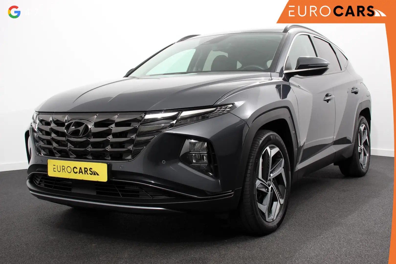 Hyundai TUCSON 1.6 T-GDI 265pk PHEV Comfort 4WD | Navigatie | Cli Grijs - 1