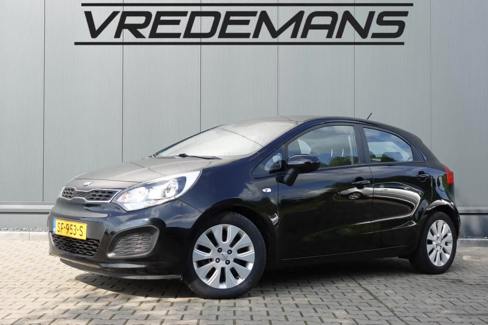 Kia Rio 1.2 CVVT Comfort Pack Zwart - 1