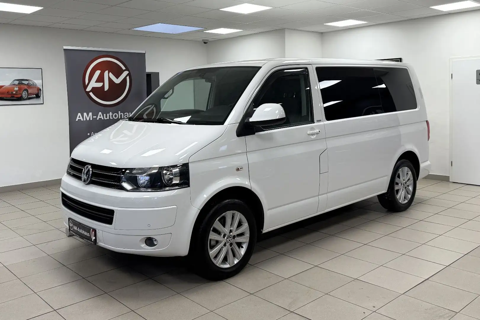 Volkswagen T5 Multivan Match *7Sitzer*Tisch*AHK*StdHzg*DAB Weiß - 1