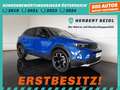 Opel Mokka e ULTIMATE Aut. *WÄRMEPUMPE / 18 ZOLL / LED / NAVI / ACC / KAMERA / TEILLEDER / KLIMAAUT.* Blau - thumbnail 1