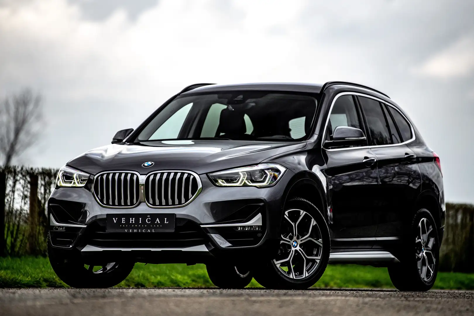 BMW X1 X-LINE | NAVI | CAMERA | DAB | SFEERVERLICHTING Grigio - 1