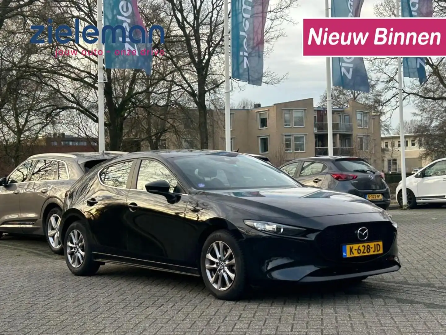 Mazda 3 2.0 e-SkyActiv-X M Hybrid 180 Comfort met Bose - C Noir - 1