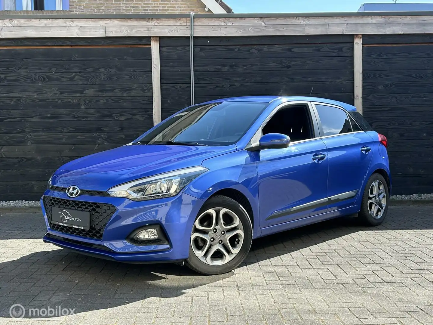 Hyundai i20 1.2 i-Motion Clima / LM / PDC / camera / Trekhaak/ Blauw - 1