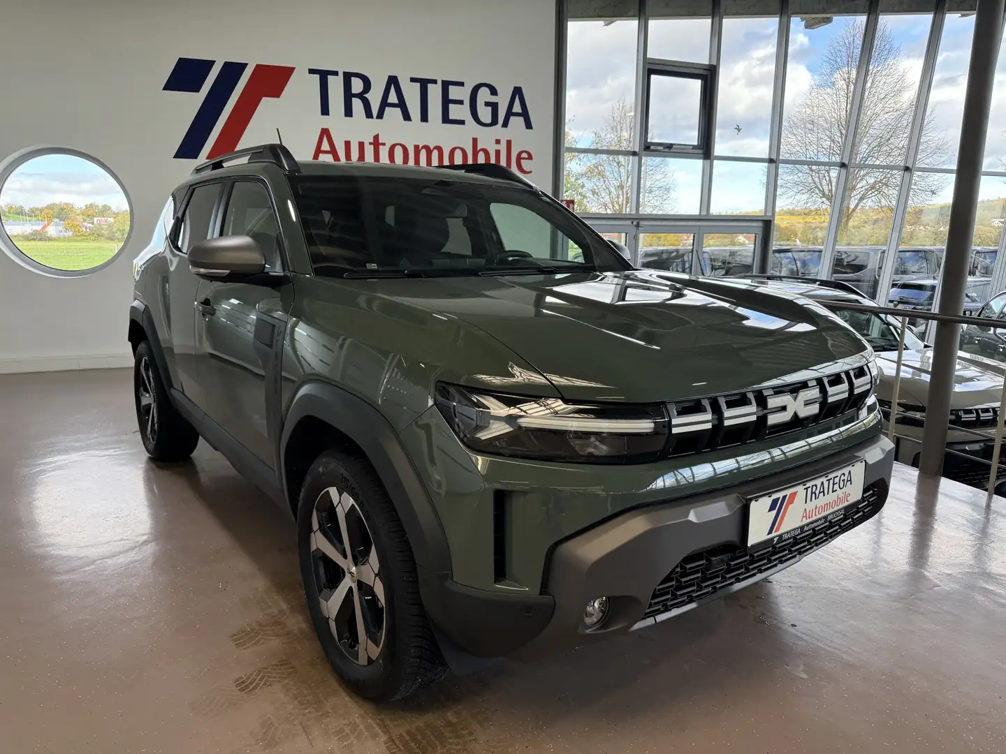 Dacia Duster mild hybrid 130 4x4 Journey City-P SH GJR Groen - 1