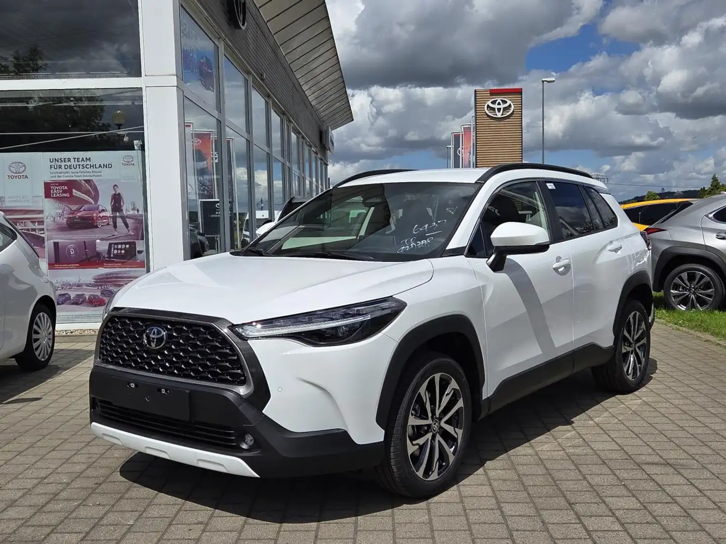 Toyota Corolla Cross 1.8 Hybrid 4x2 💥 Teamplayer 💥 Bis zu 15 Jahre Ga Weiß - 1