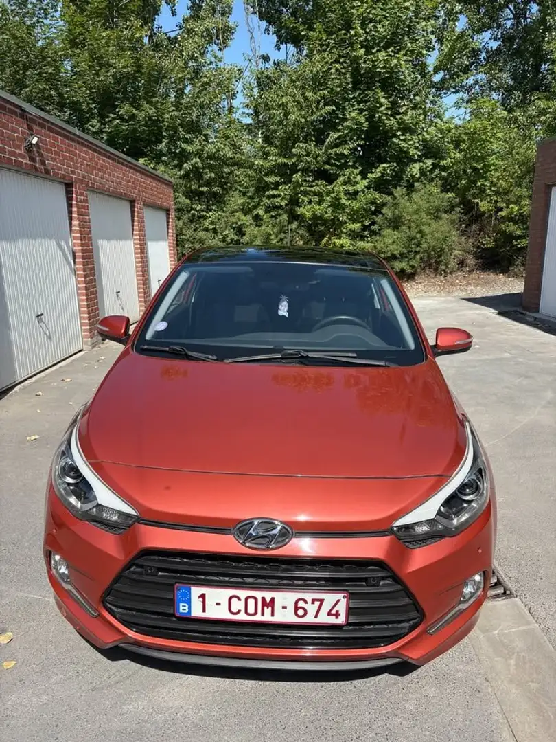 Hyundai i20 i20 Coupé 1.2i Sport+ Orange - 1