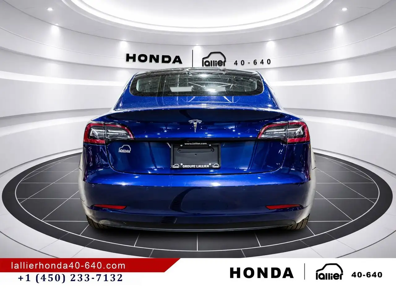 Tesla Model 3 photo Tesla Model 3