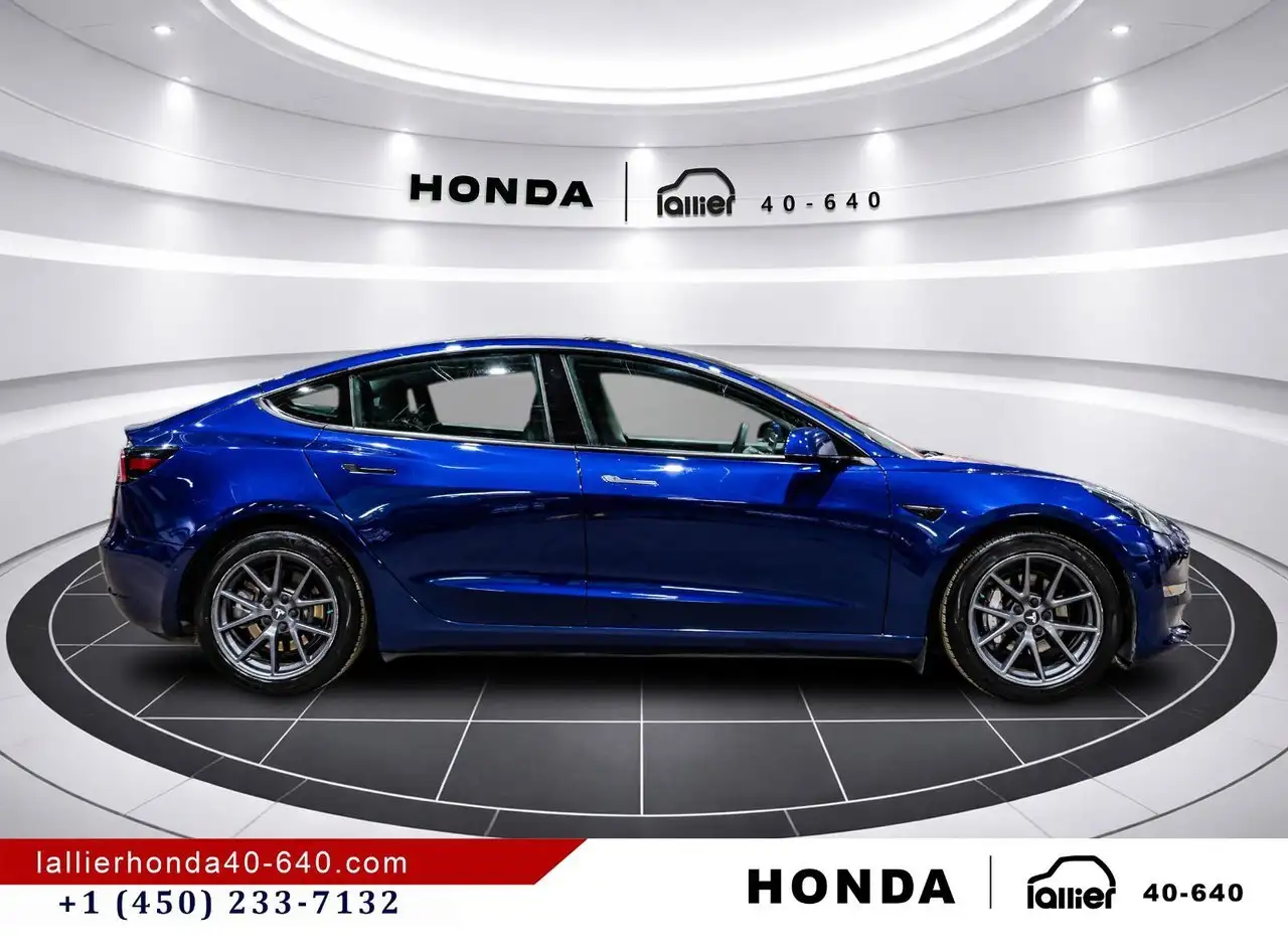 Tesla Model 3 photo Tesla Model 3
