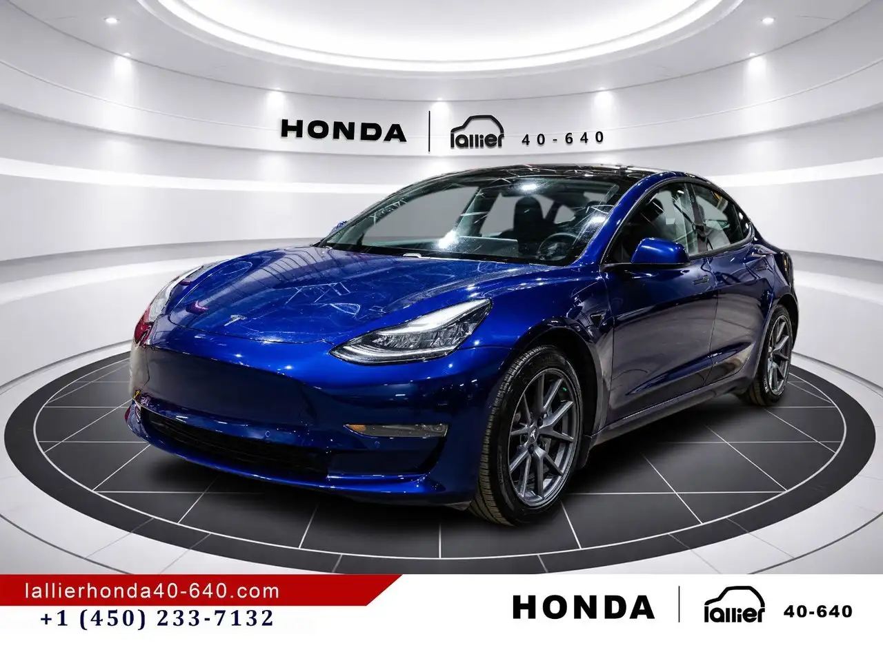 Tesla Model 3 photo Tesla Model 3