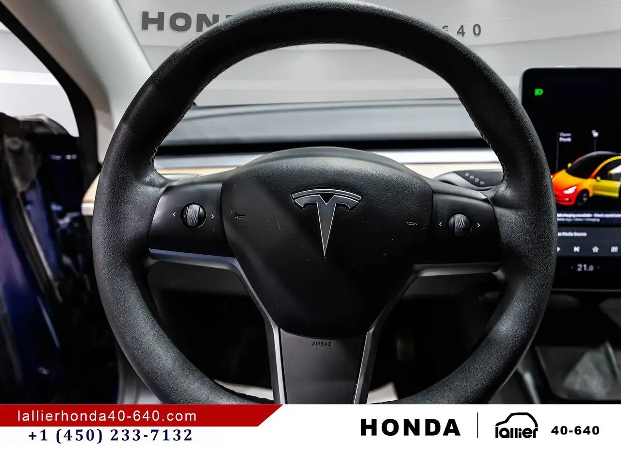 Tesla Model 3 photo Tesla Model 3